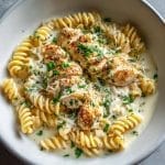 creamy garlic butter chicken and rotini in parmesan sauce