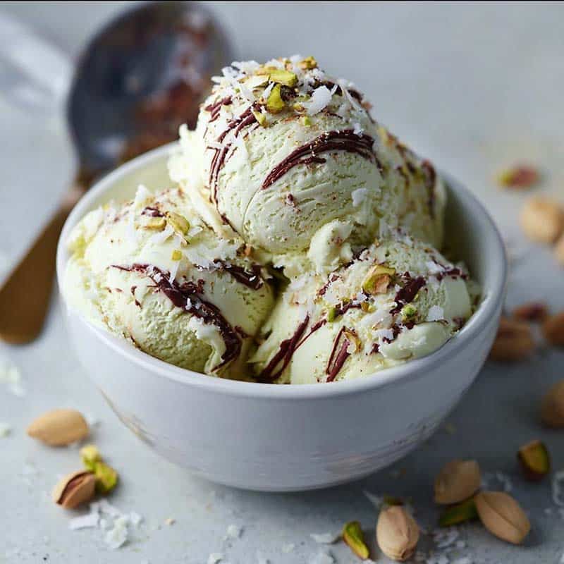 High protein pistachio ice cream in a rustic bowl