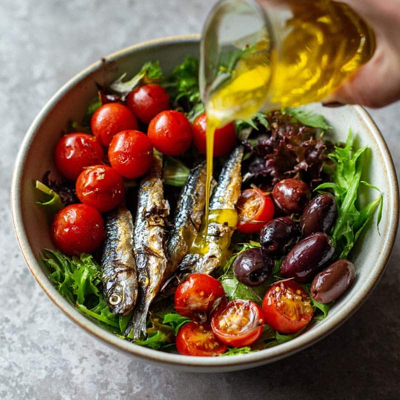 Assembling sardine Mediterranean summer bowl