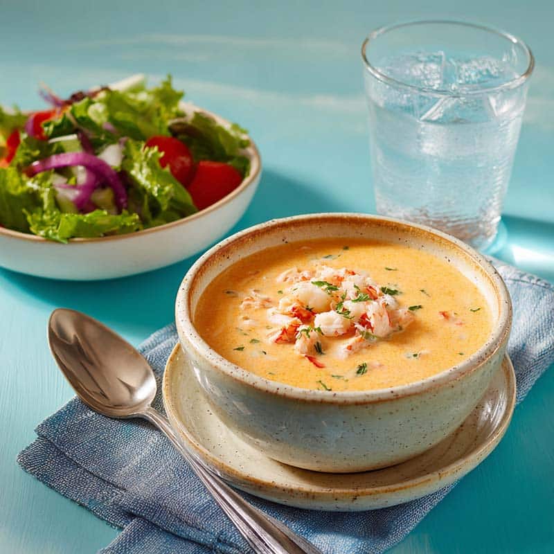 Served bowl of creamy crab and shrimp seafood bisque