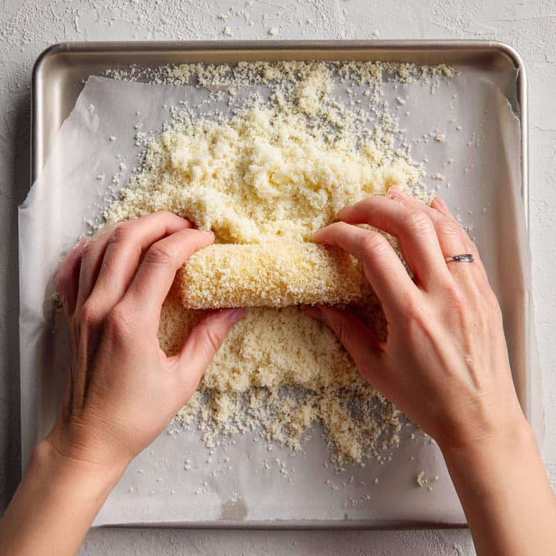 Forming and breading potato mozzarella sticks