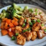 one-pan bold honey bbq chicken rice served with veggies