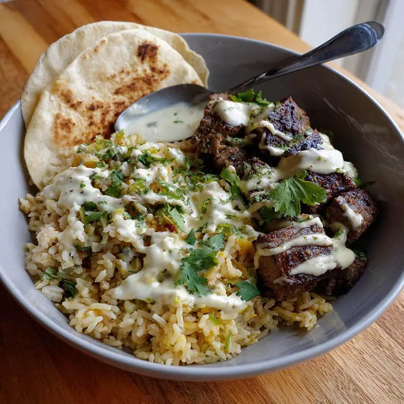 served steak queso and rice with tortilla